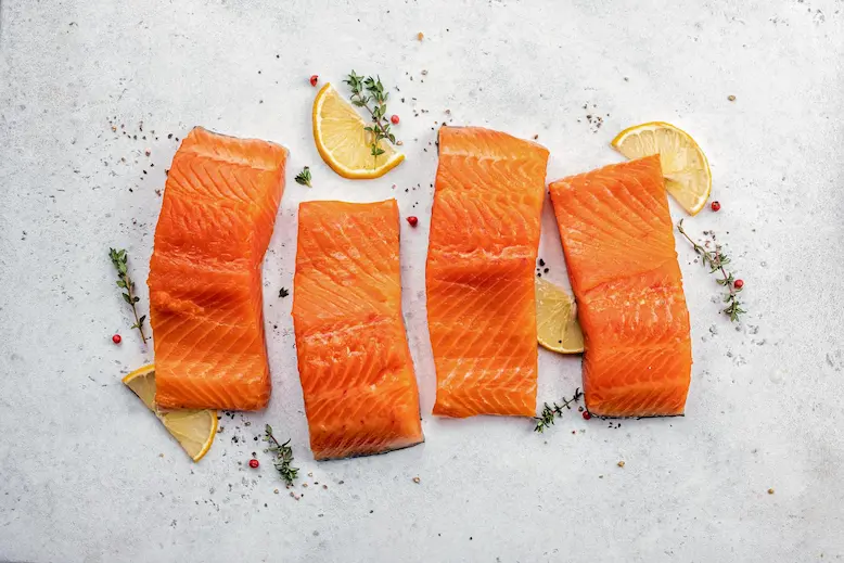 salmon-fresh-raw-salmon-fish-fillet-with-cooking-ingredients-herbs-lemon